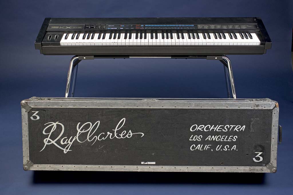 A Yamaha KX88 keyboard, owned by Ray Charles, complete with braille stickers